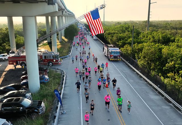 Runners start on an access road then make their way up onto the 65-foot-tall bridge. Photo: Bob Care