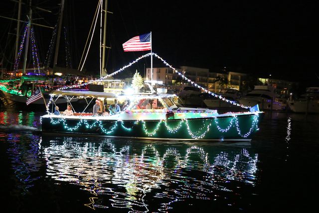 Festive lighted boat parades are planned throughout the Keys island chain, including the one shown here on Key West Harbor. Photo: Carol Tedesco