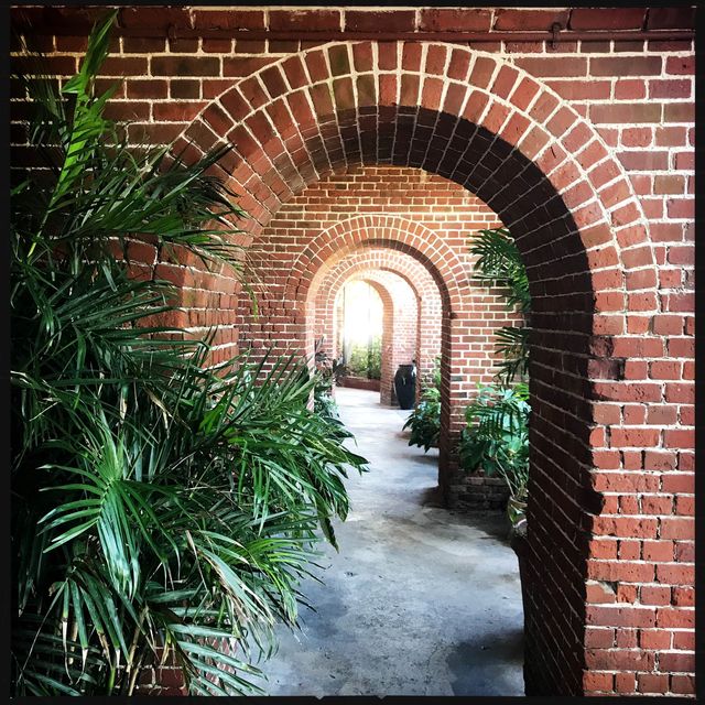 Key West Garden Club maintains gardens and the beautiful grounds at the beachside Civil War-era West Martello tower. 