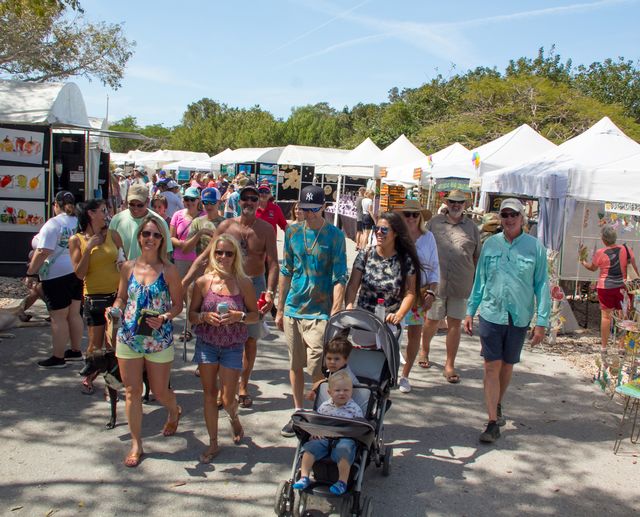 Find dozens of talented artisans showcasing a diverse collection of paintings, sculptures, jewelry, fine crafts, and more at the event's arts and crafts show. 