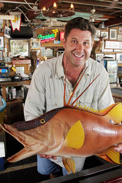 Mongelli shows off a reproduction of his most favorite icon, a hog snapper.