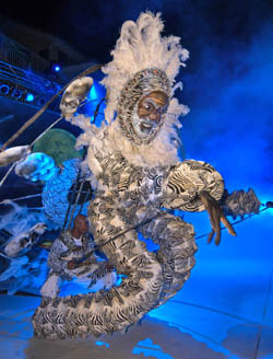 Image 1 - Stephen Tiffenson of Oakland, Calif., works his 20-foot-high "Muthamba the Witch Doctor" at the Pier House Pretenders in Paradise Costume Competition. The beginning of Fantasy Fest has been postponed to Wednesday, Dec. 7. Photo by Andy Newman/Florida Keys News Bureau