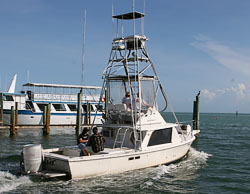 Ralph and  Michael Hildreth from Hackenstown, Penn., depart on a charter fishing boat from Islamorada Sunday to an afternoon of angling off the Florida Keys. Photo by Bob Care/Florida Keys News Bureau