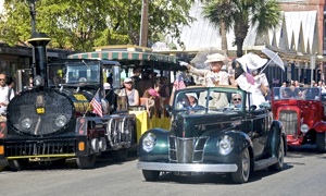 Ladies costumed in early 1900s attire participated in the parade.