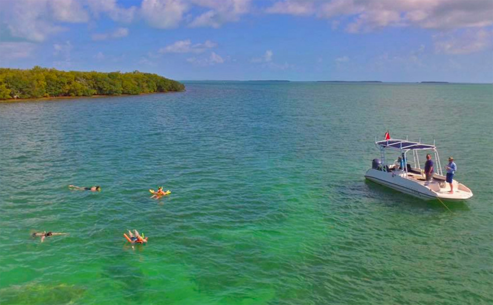 Captain Sam takes visitors on eco-tours that can include snorkeling experiences in both Florida Bay and the Atlantic Ocean. Photo: Heath Padgett