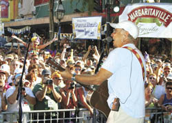 Jimmy Buffett sings to a crowd of "Parrothead" fans in 2005. Parrotheads will descend upon Key West Nov. 2-5 for the annual convention.