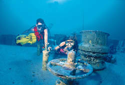 Divers examine the intentionally scuttled 327-foot former U.S. Coast Guard cutter Duane in 120 feet of water off Key Largo. Artificial reefs are an important part of the marine environment in the Keys, providing essential habitats for marine life and fish, as well as recreational opportunities for divers and fisherman. Photos by Stephen Frink/Florida Keys News Bureau.