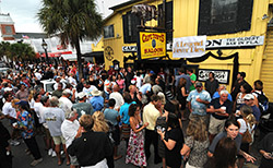 Well-wishers crowd outside Captain Tony's Saloon Saturday to celebrate the life of "Captain Tony."