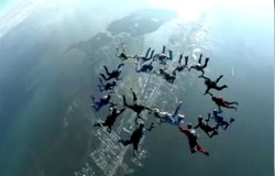 Group skydive formation over Marathon.